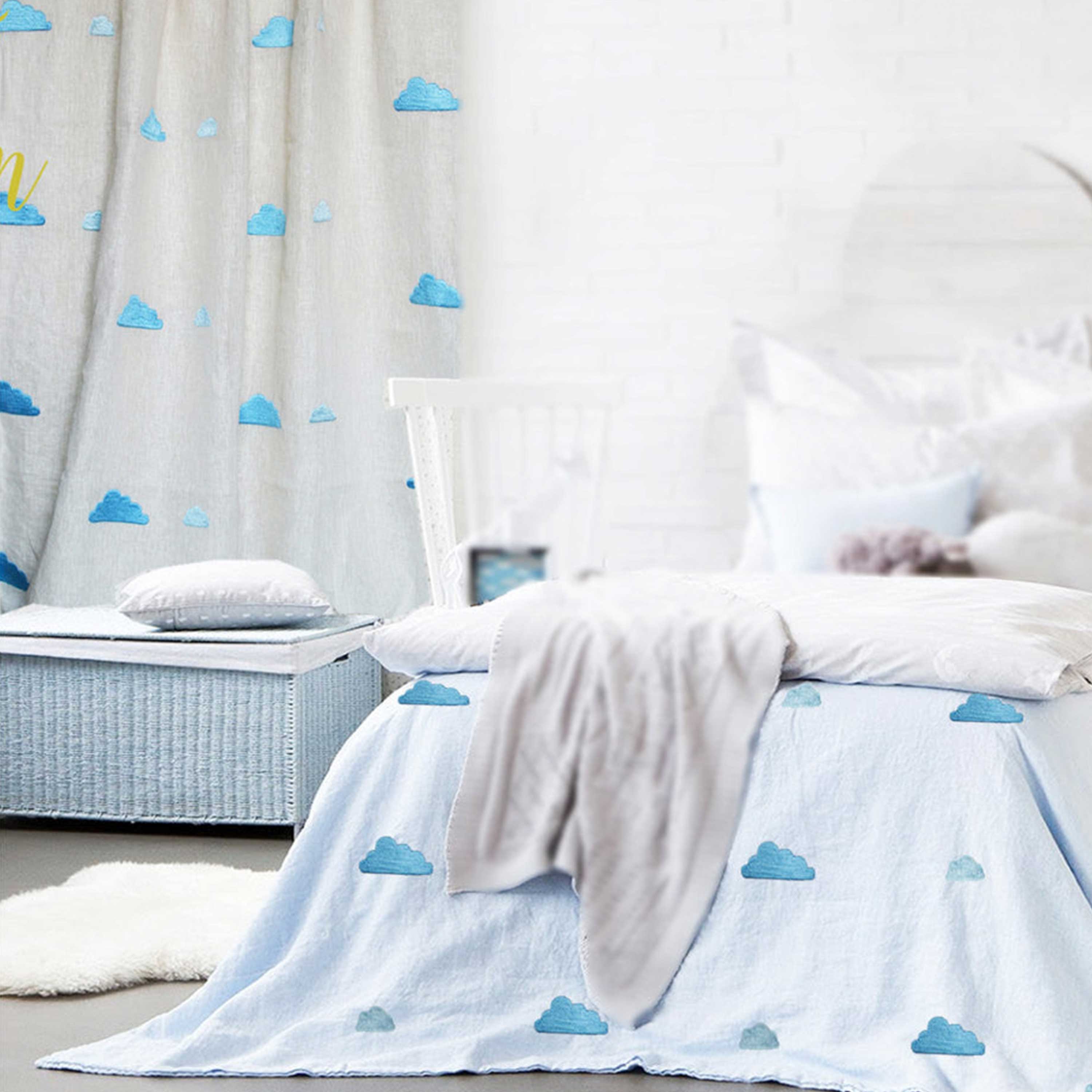 Ivory linen curtains with blue cloud embroidery, perfect for kids' rooms, nurseries, or dorms to create a cute, soothing atmosphere.