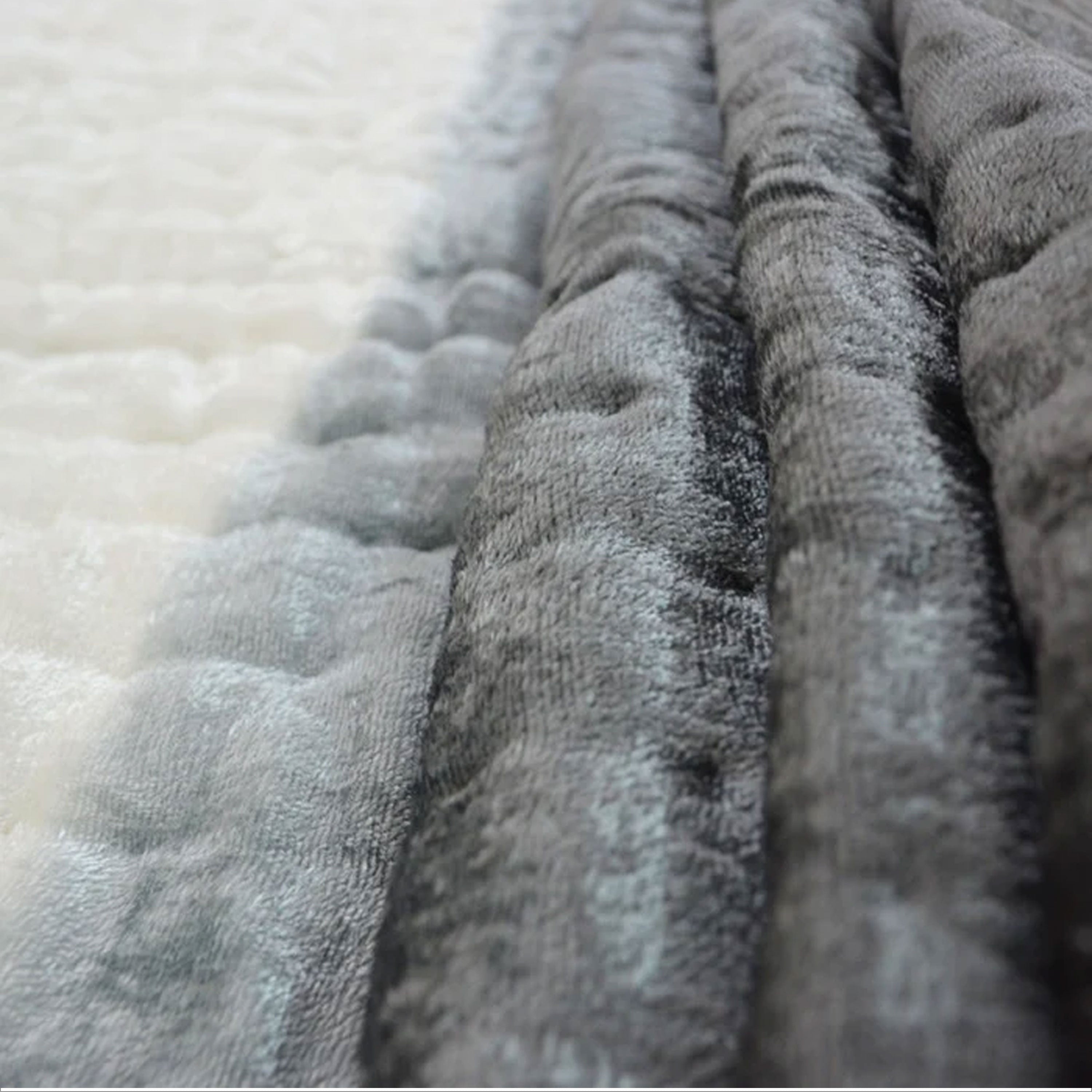 "Handcrafted ombre black velvet quilt with cotton batting, dip-dyed for unique texture, reversible to off-white cotton backing."