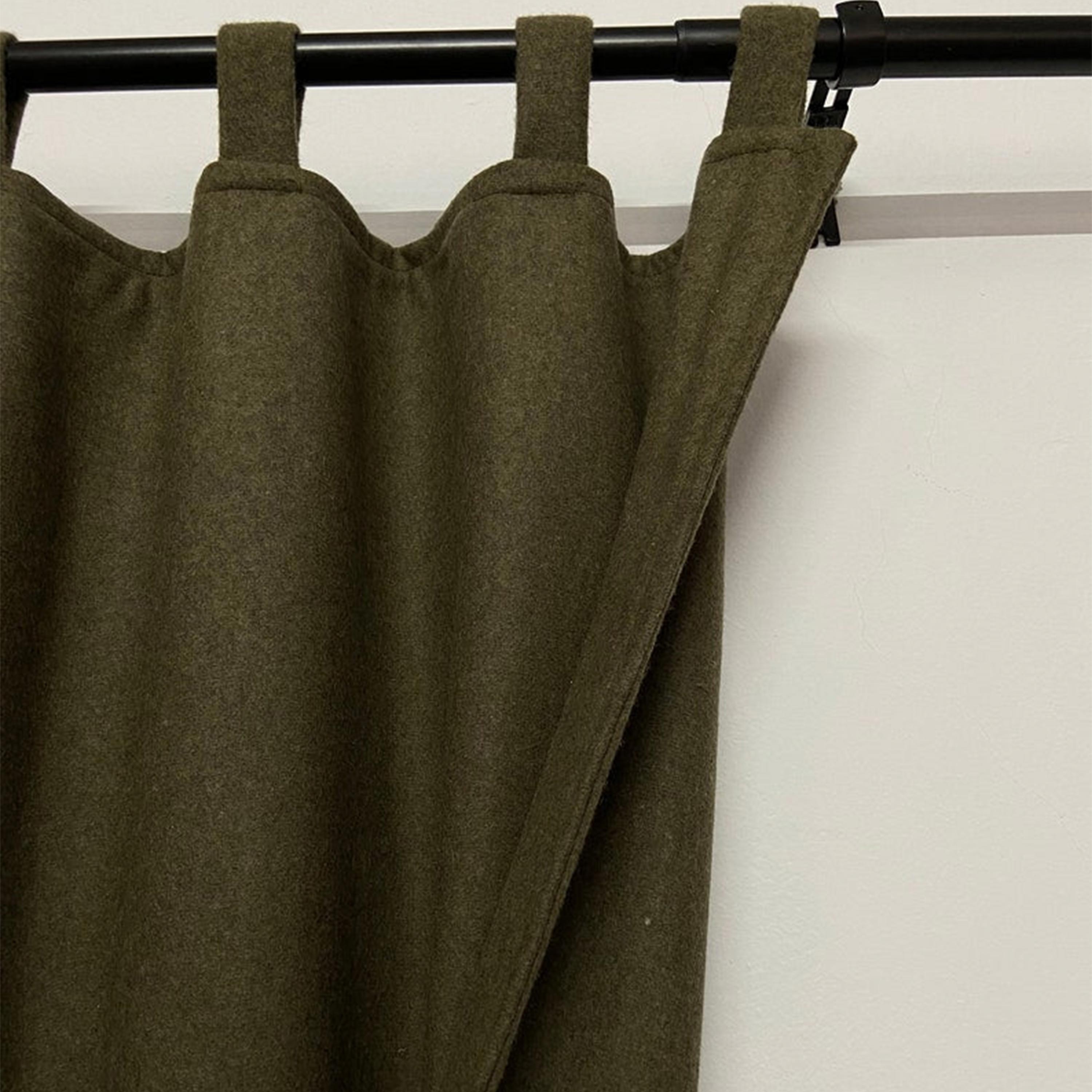 This double-layer curtain, crafted from high-quality wool fabric in a tab-top style, adds warmth and elegance to your décor.