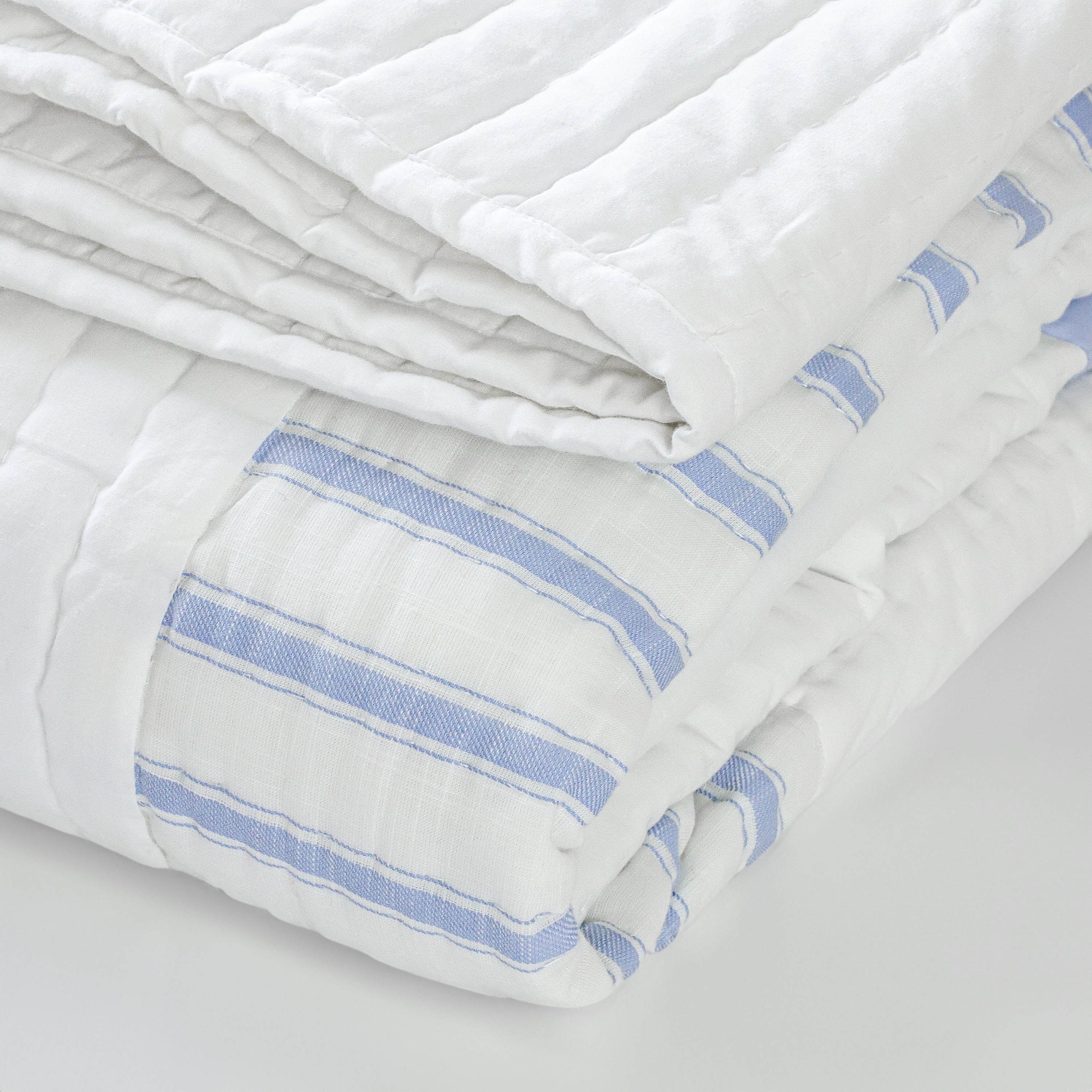 Handmade nursery quilt – a soft and breathable all-season blanket featuring striped cotton patchwork. Available in twin quilt queen and king sizes.