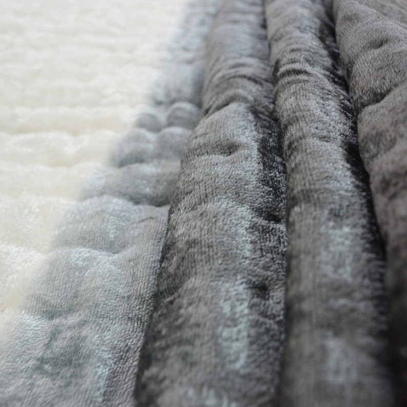 Traditional hand-quilted: This quilt features a cotton fabric backing, lightweight cotton stuffing, and is machine washable on a gentle cycle. Do not tumble dry.