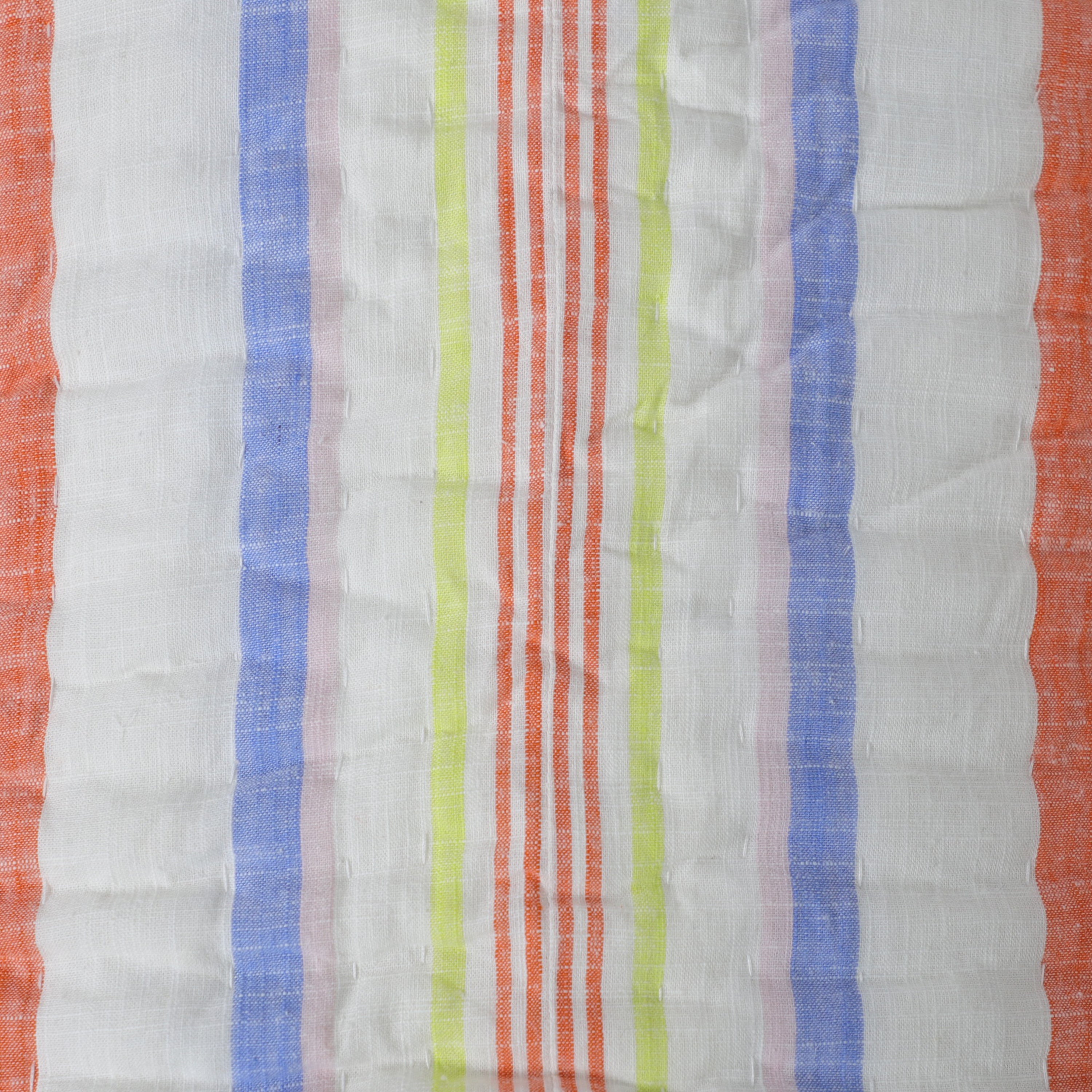 Pick-stitched for added detail, this quilt is crafted with cotton fabric on both sides, featuring a blue-and-white striped edge on the top and solid cotton on the reverse. It’s filled with soft cotton batting for extra comfort.