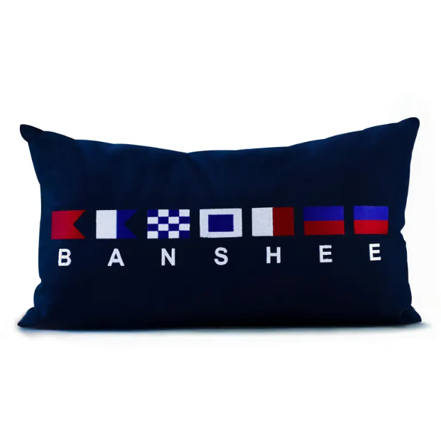 "Custom embroidered nautical flag pillow cover with personalized maritime signal design in navy blue."