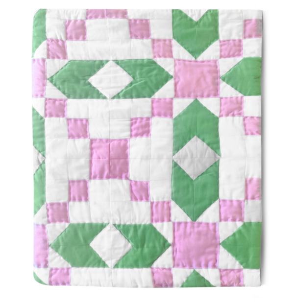 Handcrafted lightweight quilt for kids' rooms or dorms – a cozy, hypoallergenic, and stylish décor piece. Available in lap quilt, twin quilt, queen and king sizes.