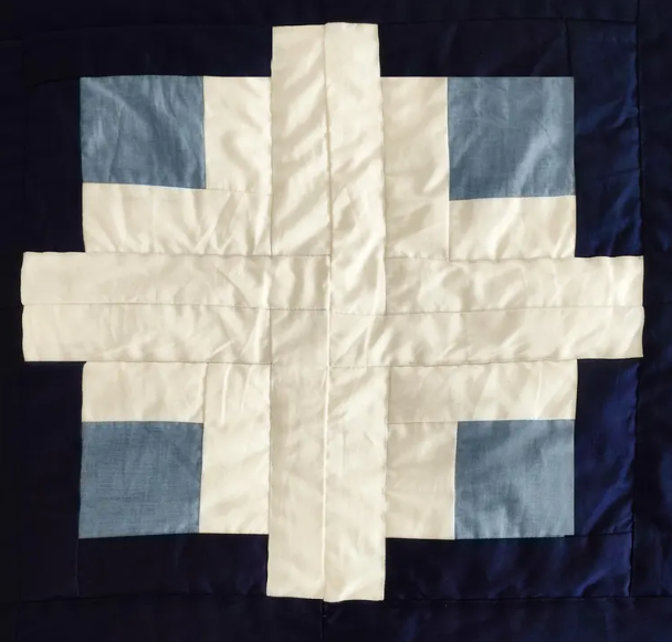 All-season breathable navy blue cotton quilt. Custom size hand-stitched blankets for bedroom and guest rooms. Available in lap size bedding and twin size bedding.