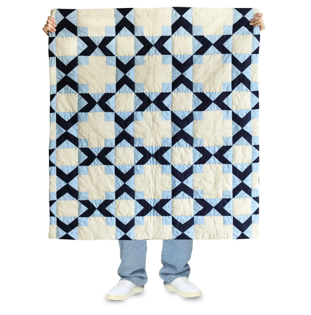 Handmade geometric patchwork quilt in navy and ivory cotton. Perfect as a cotton comforter.