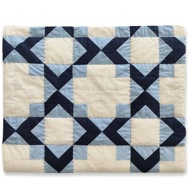 All-season breathable navy and ivory cotton quilt. Custom size hand-stitched blankets for bedroom and guest rooms. Available in lap size bedding and twin size bedding.