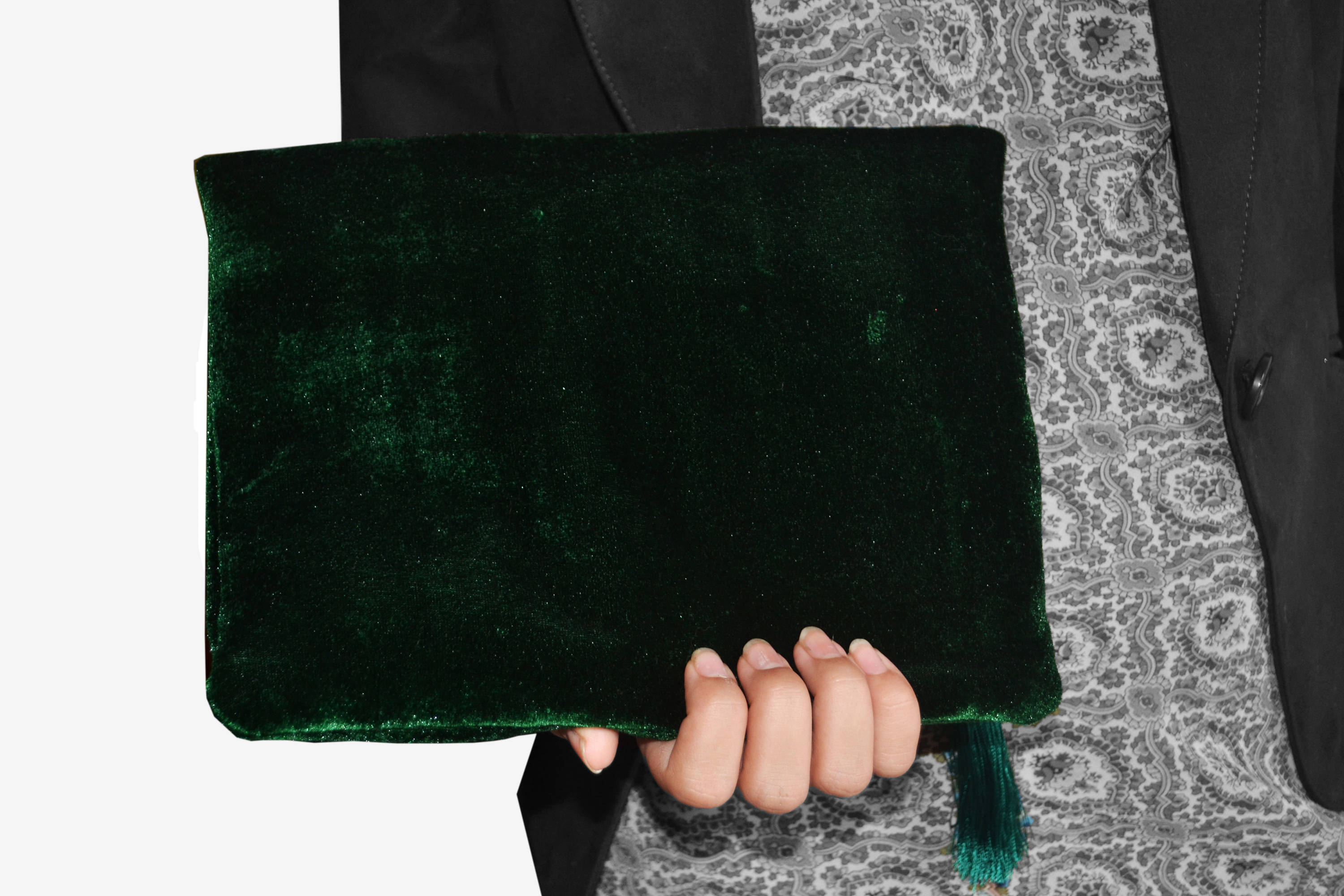 Amore Beaute Crafted from luxe emerald green velvet, this clutch folds over to make it compact and easy to carry. 