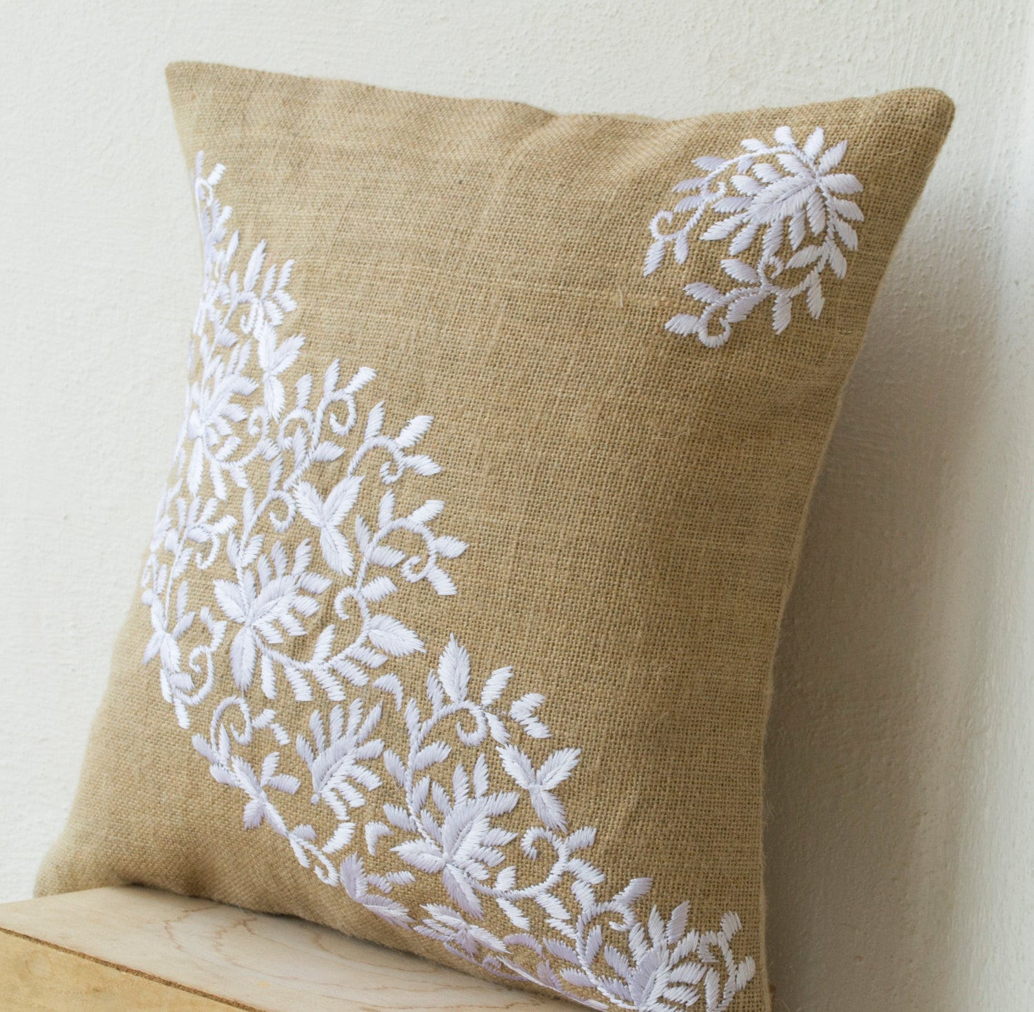 Handmade burlap pillows with white flower leaves embroidery