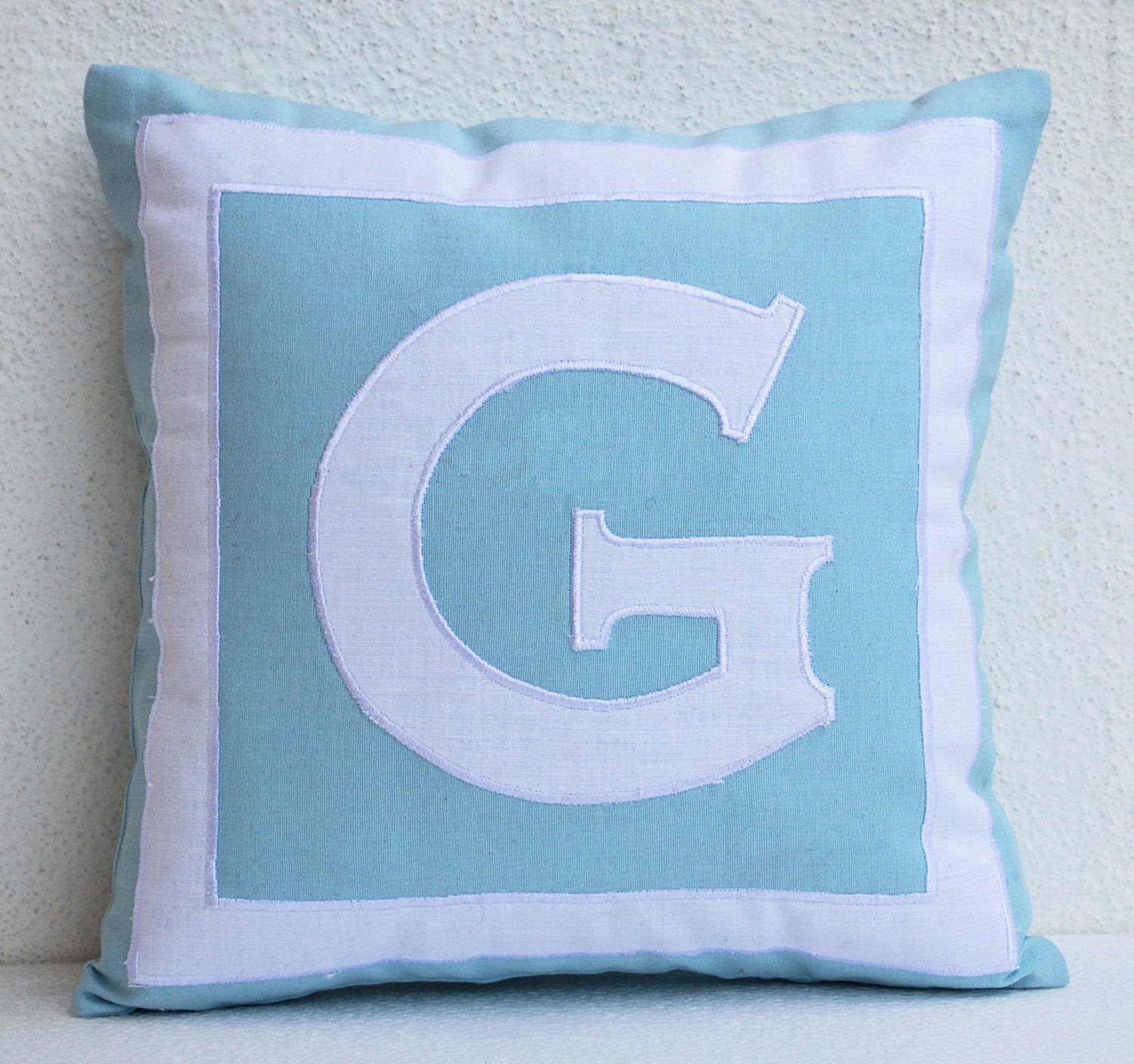Handmade pillow covers with custom monogram, dorm pillow cover