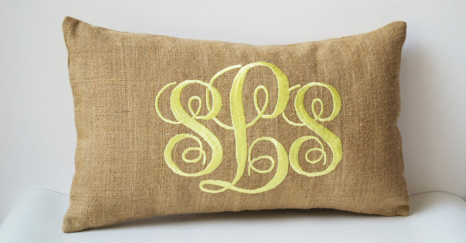 Handmade pillows with cursive design and monogram