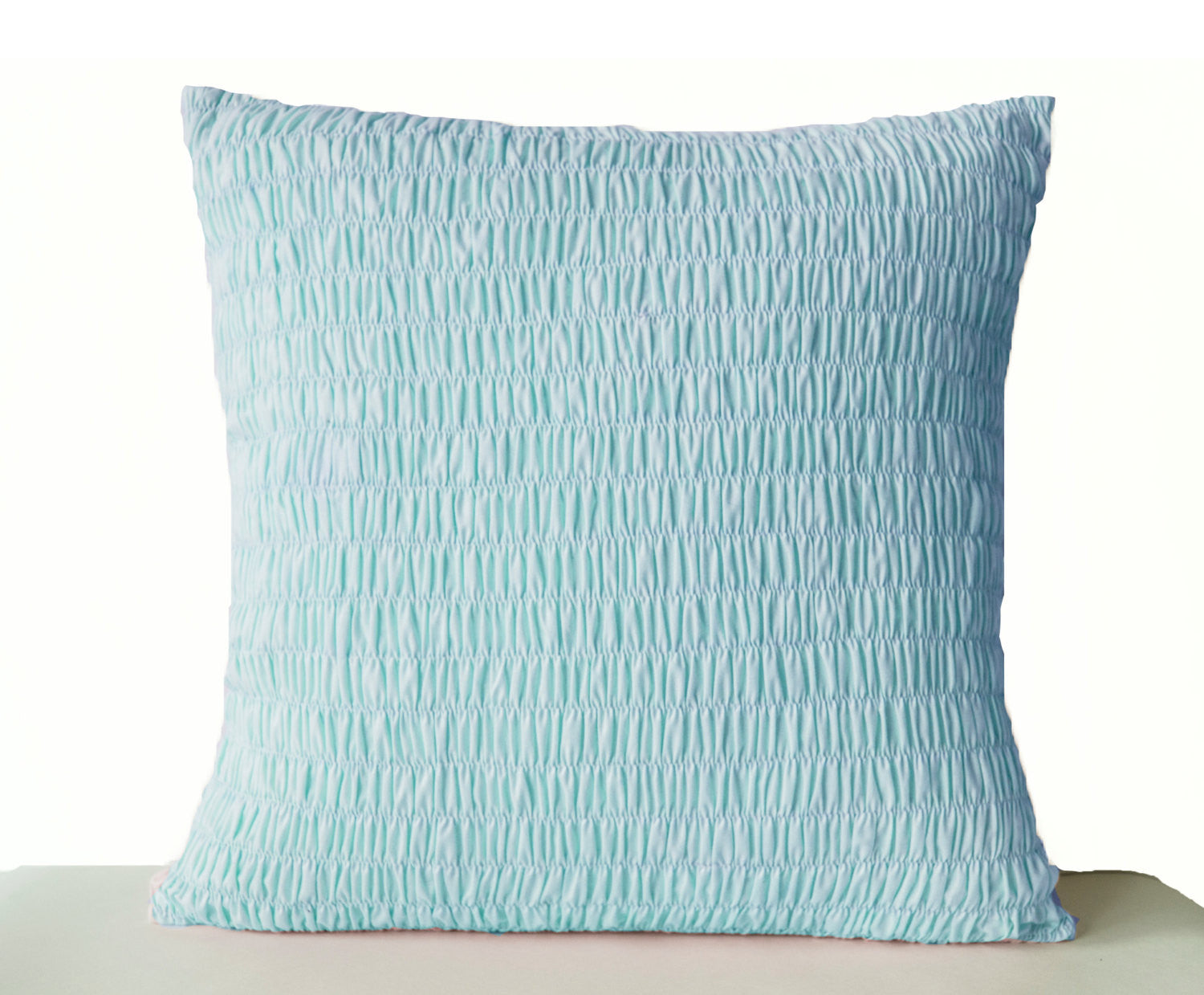 Handmade light blue cotton throw pillow with pleats