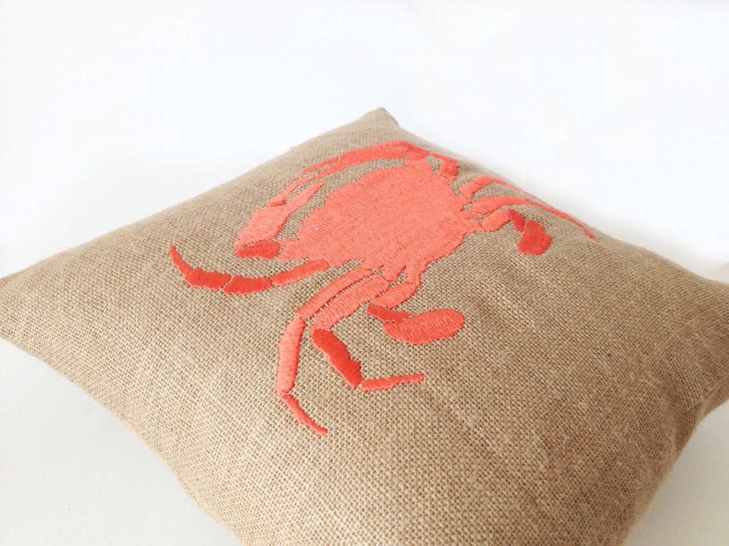 Handmade sea pillow cover with embroidered crab design