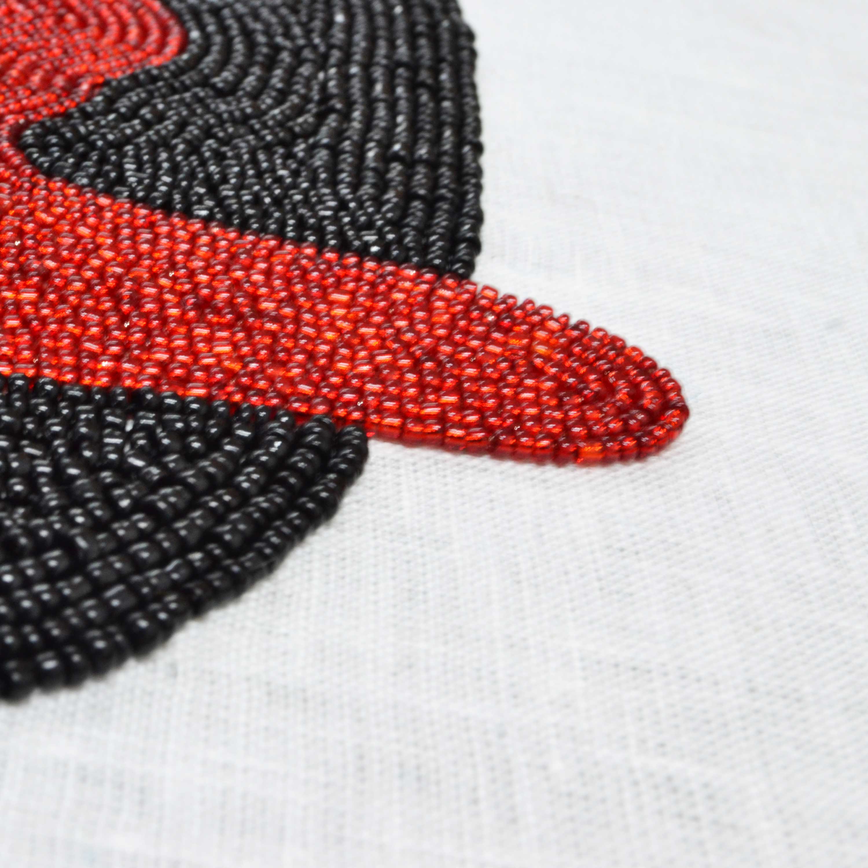 Red Black Beaded Spider on Lips Wall Art Unframed