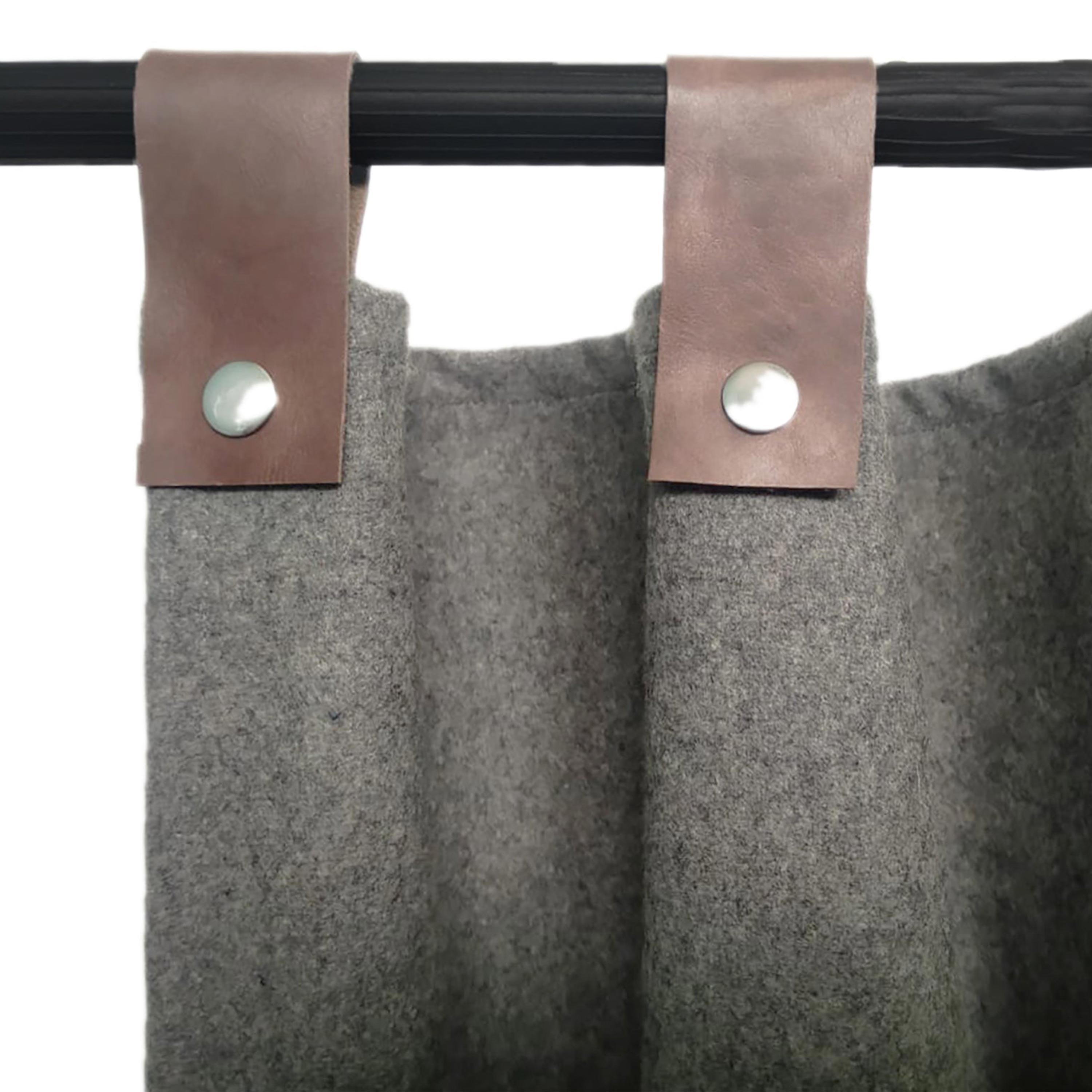 "Handcrafted wool curtains with snap button leather tabs for easy installation, offering a stylish, modern, and functional window solution."