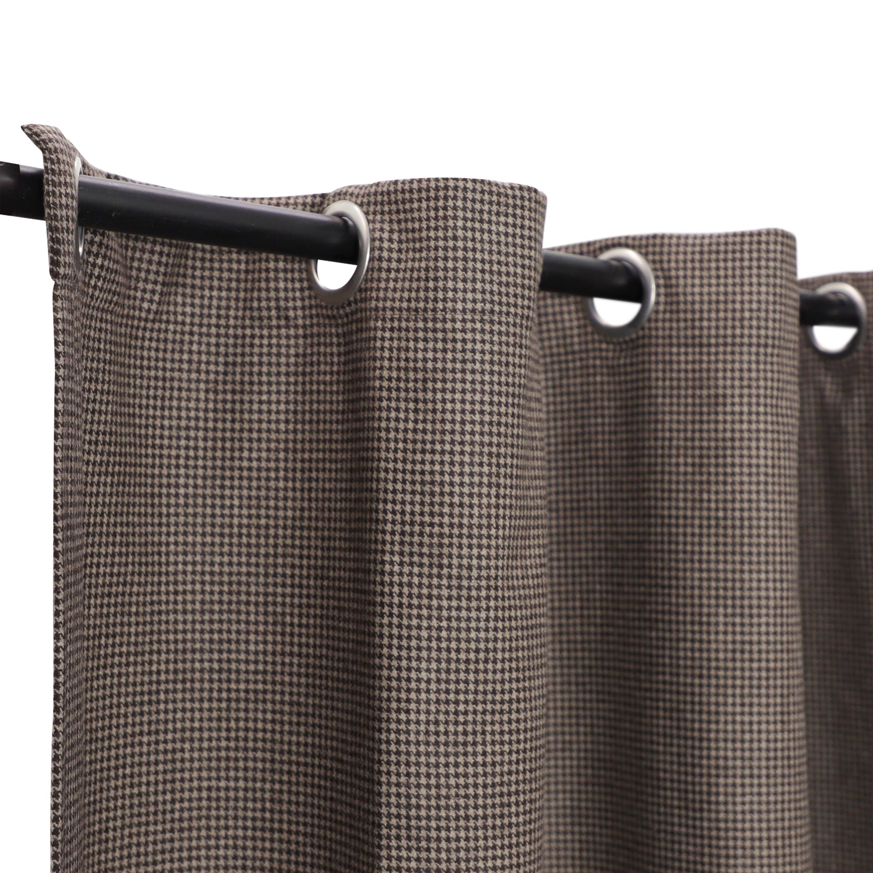 Thermal window and door curtains made from luxurious wool felt in a beige and brown houndstooth pattern. Crafted from premium-quality fabric, these grommet-style drapes bring warmth and sophistication to your room décor.