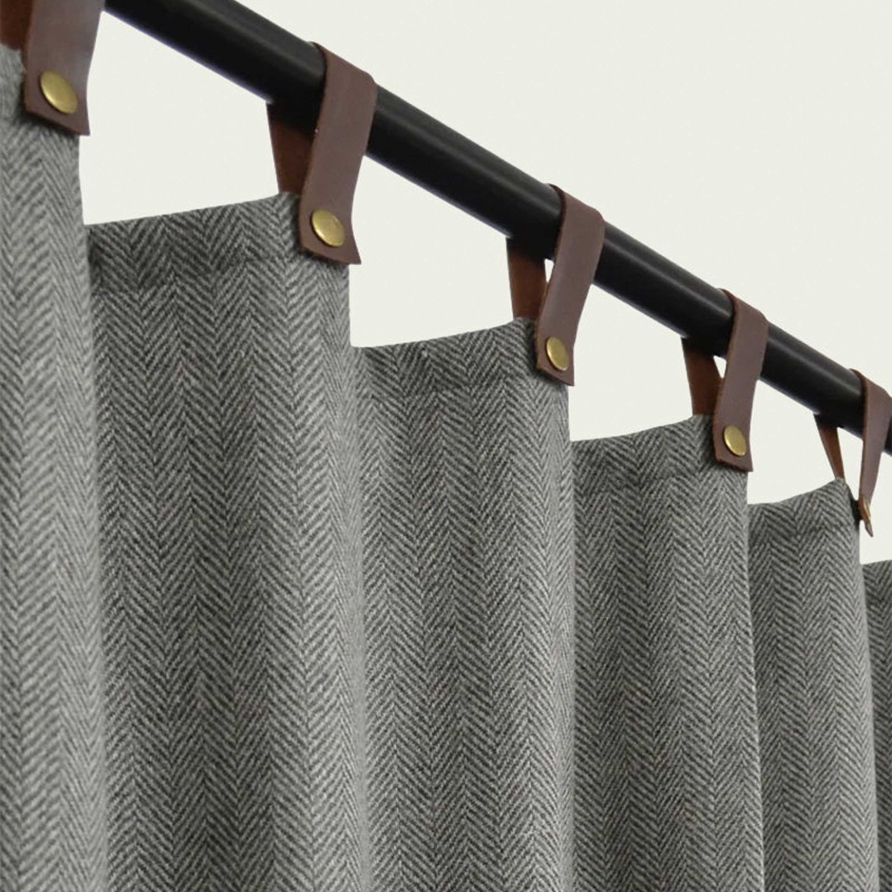 Custom-made curtains featuring wool fabric, cotton lining, genuine leather tabs, and brass snap buttons. These curtains offer SPF 50+ protection, providing broad-spectrum UVA and UVB shielding for your windows. Tested according to AATCC 183:2020 standards by the American Association of Textile Chemists and Colorists.