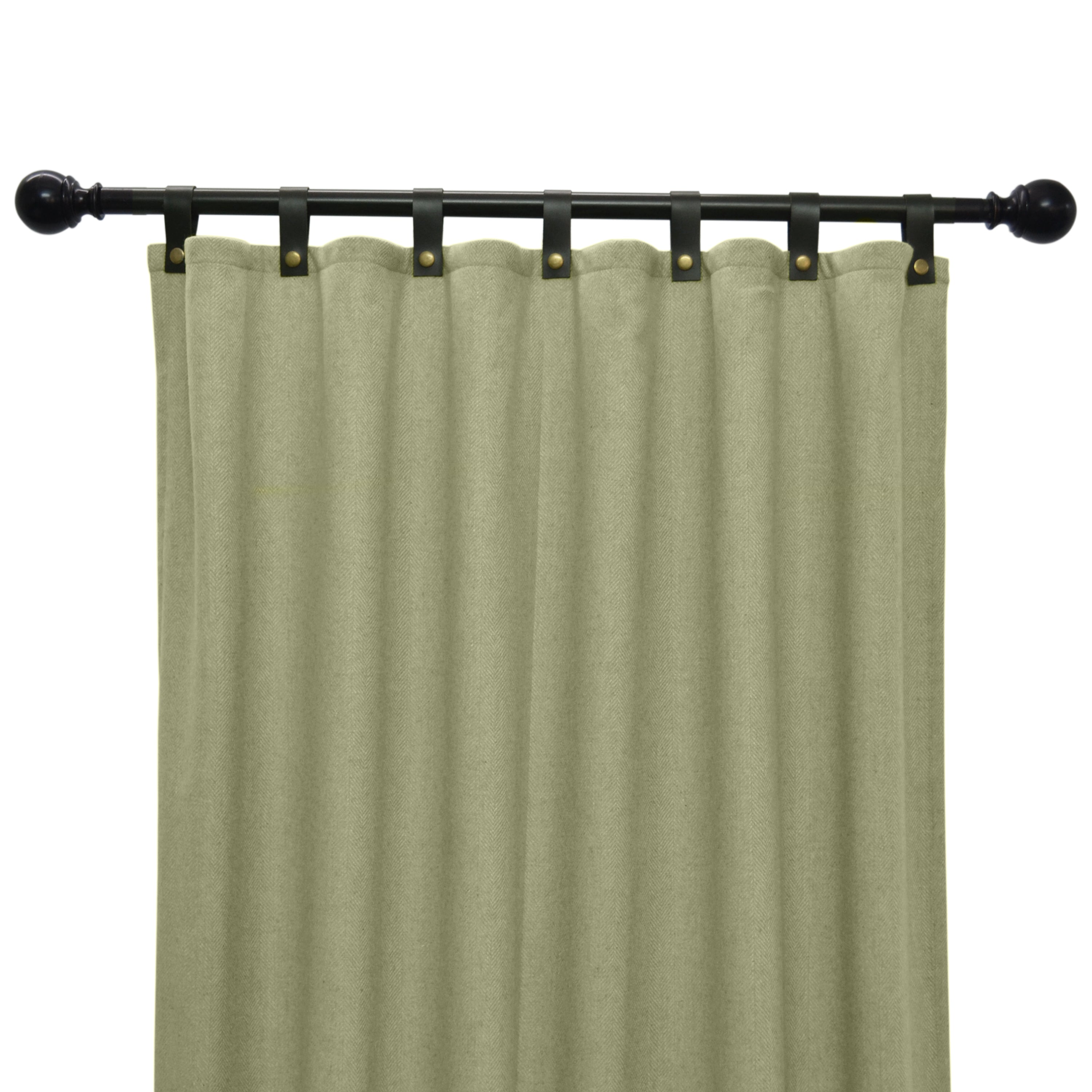 Bespoke green chevron wool curtains with leather accents. These curtains for windows and doors are expertly crafted from beautiful wool fabric with a herringbone design.