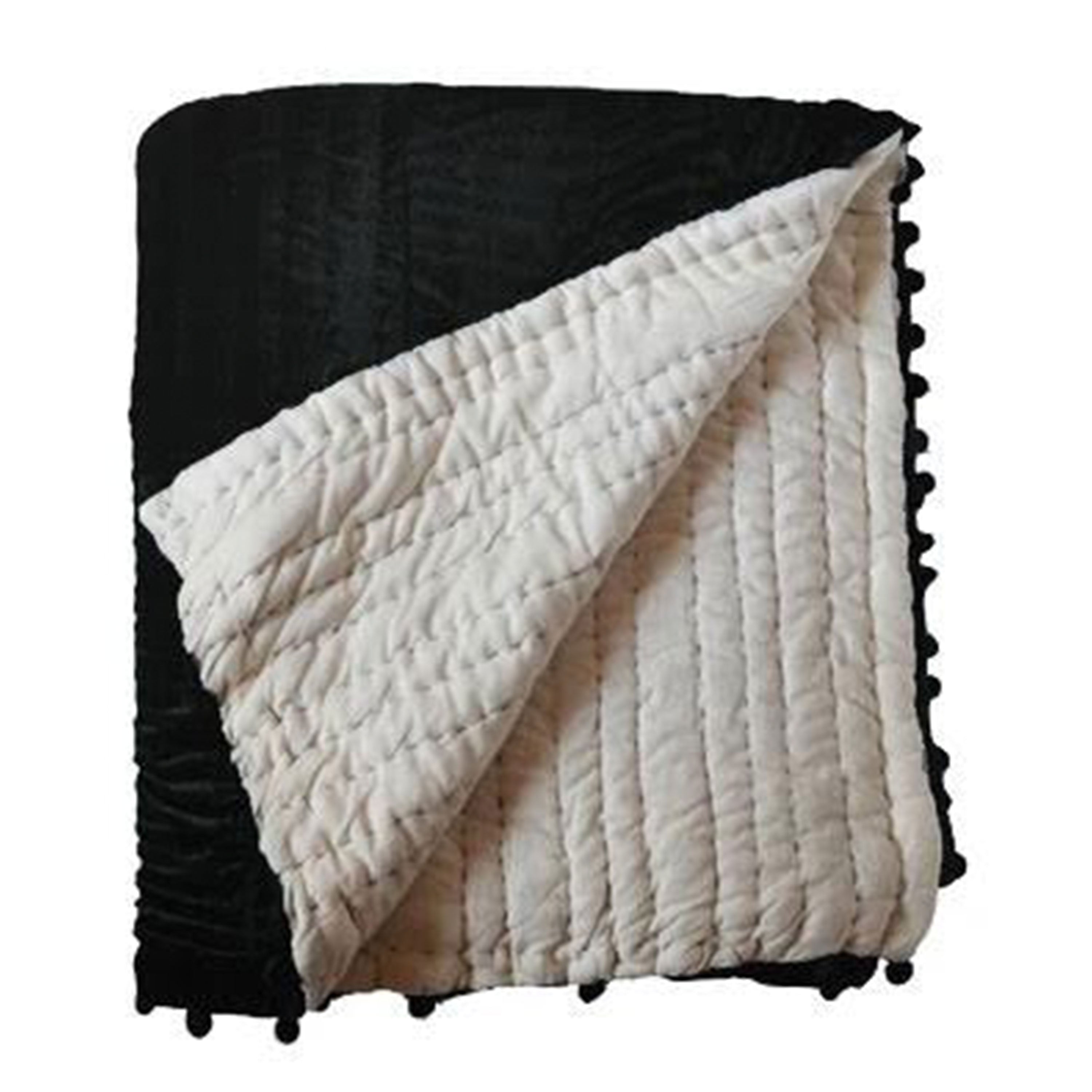 Traditional hand quilting and pick stitching enhance this quilt, made with velvet on top, reversing to cotton voile and filled with cotton batting. Machine washable on a gentle cycle for easy care.