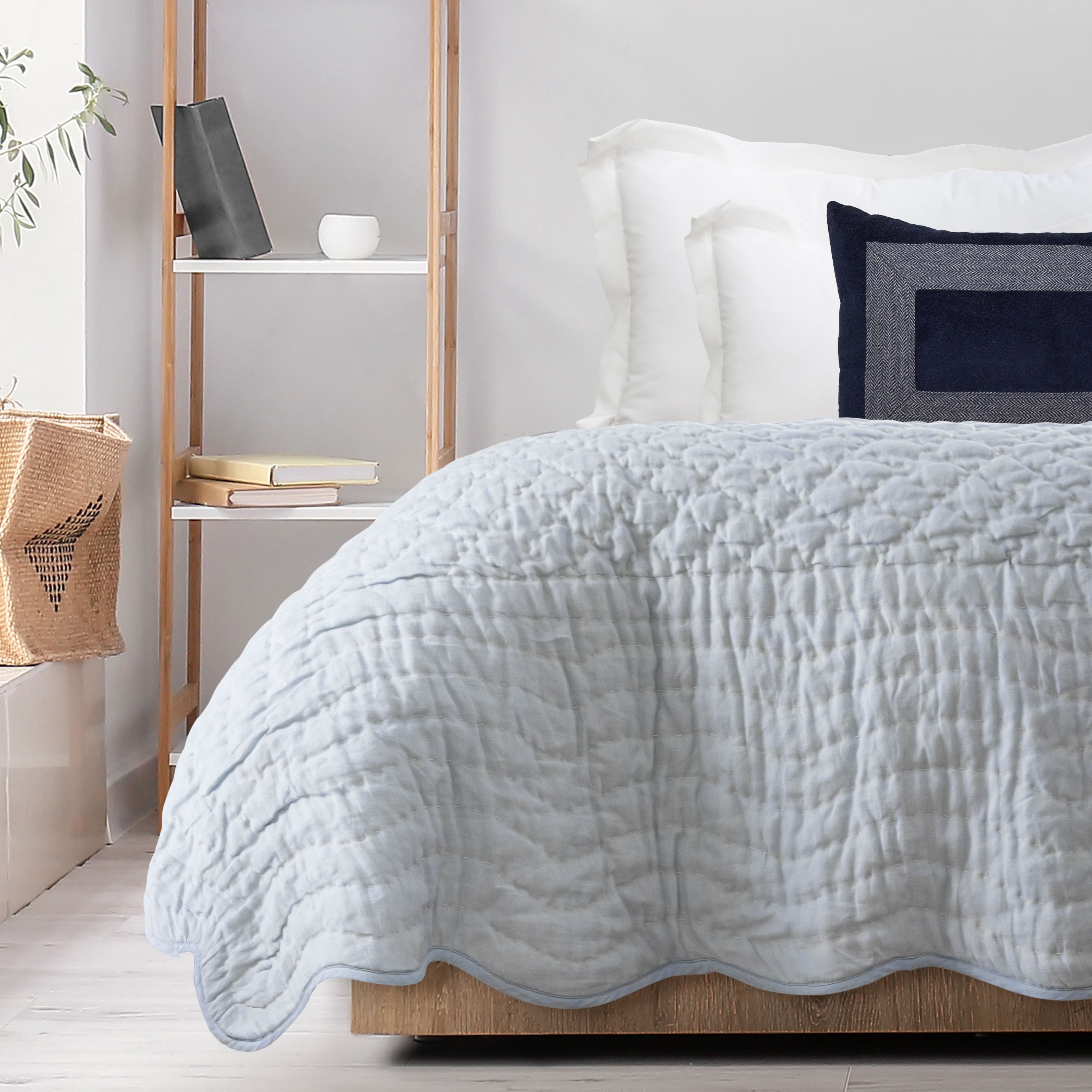  Handcrafted scallop edge linen quilt offers a symphony of texture and tranquility. Expertly crafted scallops dance along the edges, creating a soothing and elegant finish.