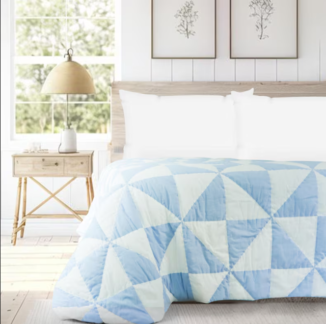 "Handcrafted 100% cotton quilt with pinwheel patchwork technique, pre-washed for softness, offering lightweight, breathable comfort and timeless blue & white design."