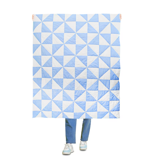 "Handcrafted Amore Beaute Cotton Quilt with blue & white pinwheel patchwork design, offering lightweight, breathable comfort for year-round use."