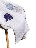 Amore Beaute Hand-quilted elephant design give this white and blue quilt an instant heirloom appeal.