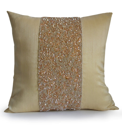Handmade beige silk throw pillow with beads and sparkles