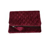 Amore Beaute satin lined interior has enough space for cell phone, keys and make up essentials.