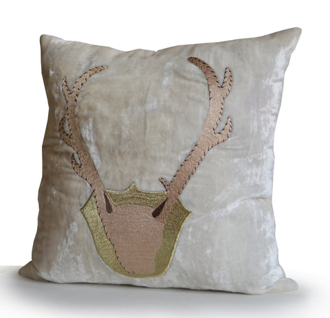 Handmade ivory velvet throw pillow with golden antler embroidery
