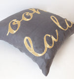 Amore Beaute Gray Linen Throw Pillow Cover with Gold Ooh La La Embroidery Success