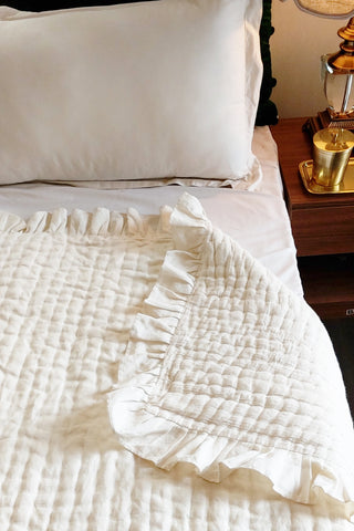 Amore Beaute linen throw blanket is pre-washed for a natural and soft look.