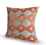 Handmade ivory throw pillow with orange ikat embroidery