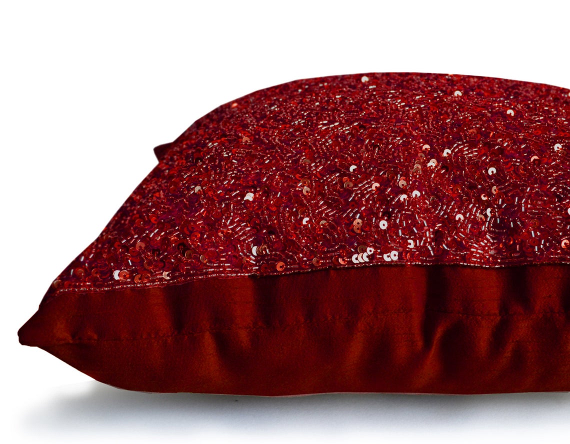 Amore Beaute Throw pillow cover in deep red faux silk with sequin and beads confetti in red. 