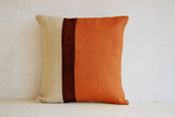 orange brown striped pillow