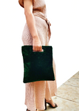 Amore Beaute Green Velvet Monogram Purse with Magnetic buttons for closure.