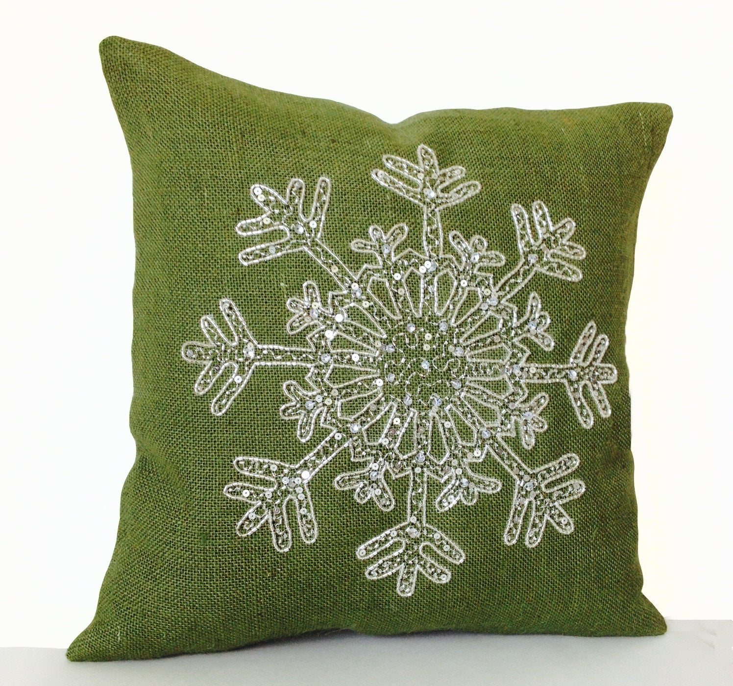 Amore Beaute Christmas pillow covers holiday décor with snowflake in silver sequins embellished on green burlap.