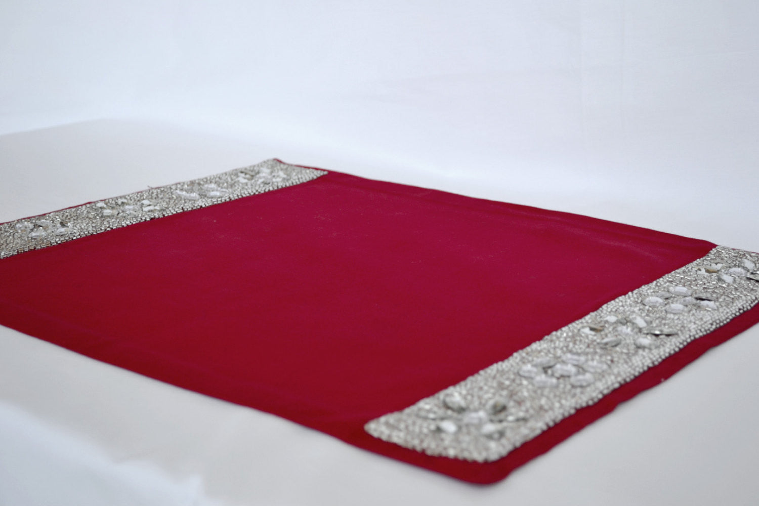 Amore Beaute Red placemats with diamond glaze.