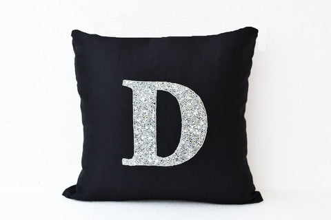 Handmade black linen pillows with monogram and sequin