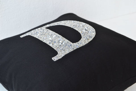 Handmade black linen pillows with monogram and sequin
