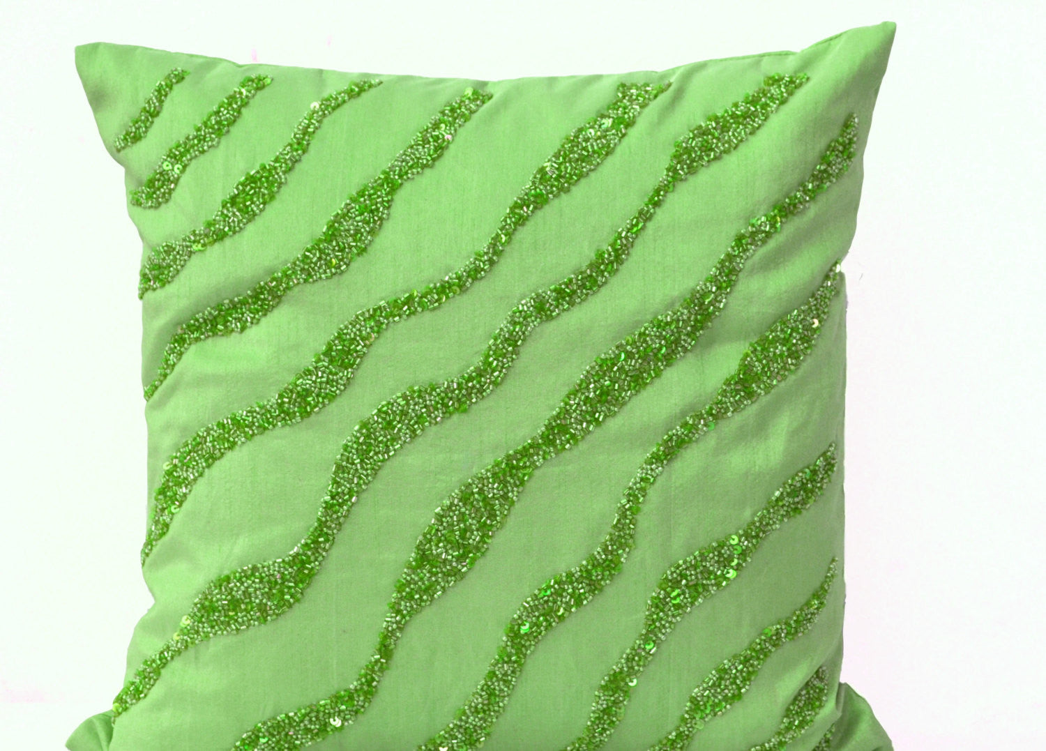 Handmade green throw pillows with beads and sequin