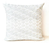 Handmade ivory white throw pillows with embroidered waves