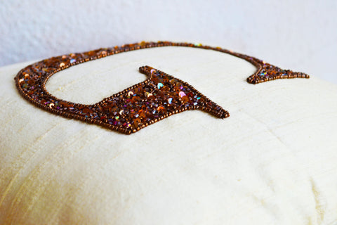 Handmade silk monogrammed throw pillow cover with bronze sequin