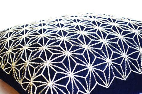 Handmade navy blue throw pillow with silver embroidered hemp leaf