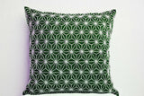 Handmade emerald green throw pillow with embroidered hemp leaf