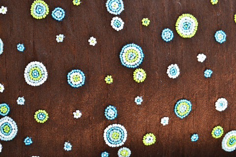 Handmade brown silk cushion cover with beaded polka dots