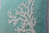 Handmade teal pillow with white coral in beads