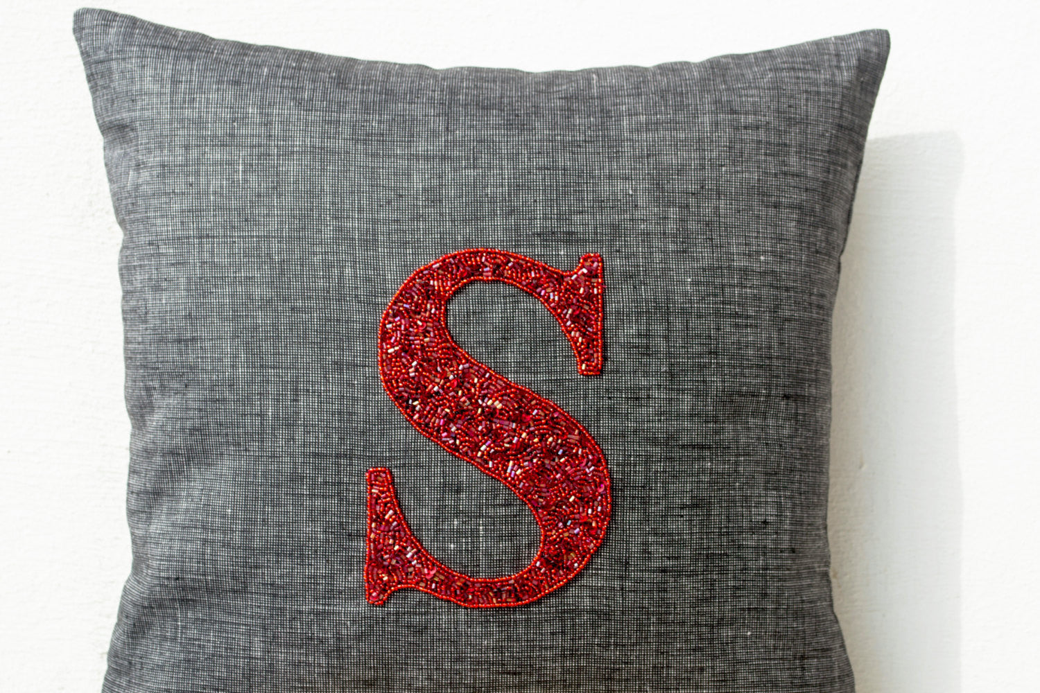 Initial sequin clearance pillow