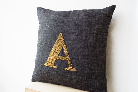 Handmade gray linen pillow with monogram and sequin