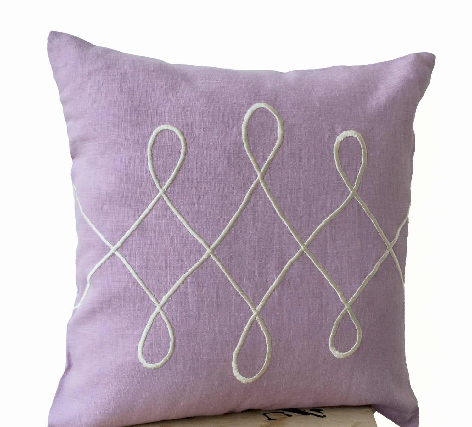 Handmade linen purple pillow with white embroidery